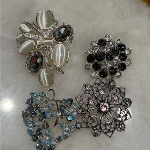 Silver and Black Floral Brooch Collection